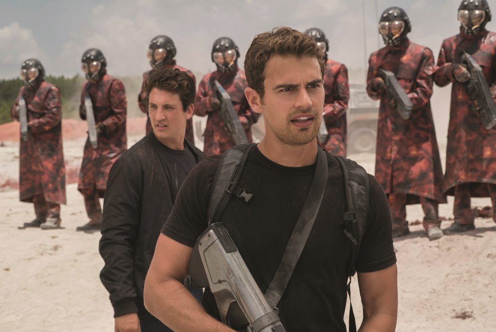Four (Theo James) and Peter (Miles Teller) in a scene from THE DIVERGENT SERIES: ALLEGIANT, directed by Robert Schwentke. Four (Theo James) and Peter (Miles Teller) in a scene from THE DIVERGENT SERIES: ALLEGIANT, directed by Robert Schwentke.
