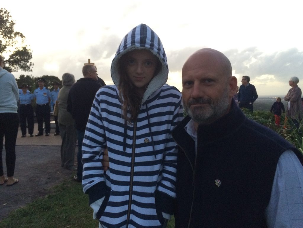 Image for sale: Buderim man Jim Wallis and his daughter Lily reflect after this morning's Buderim Dawn Service.
