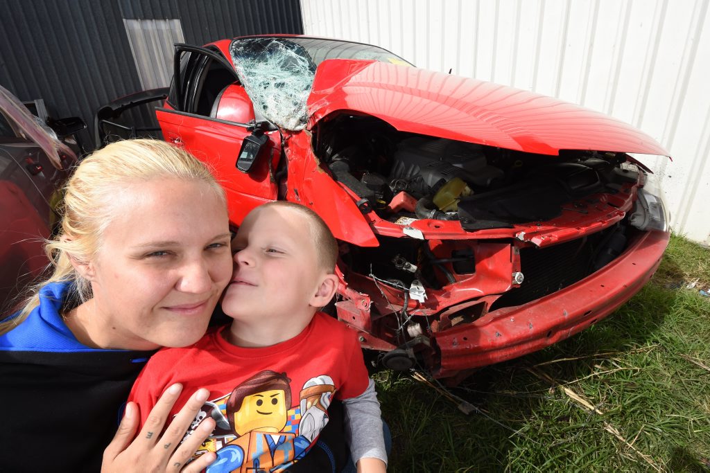 Jessica Dhu with her five year-old son Rihan Jarrett who saved her life after waving down traffice after an accident. Photo Marc Stapelberg / The Northern Star Jessica Dhu with her five year-old son Rihan Jarrett who saved her life after waving down traffice after an accident. Photo Marc Stapelberg / The Northern Star