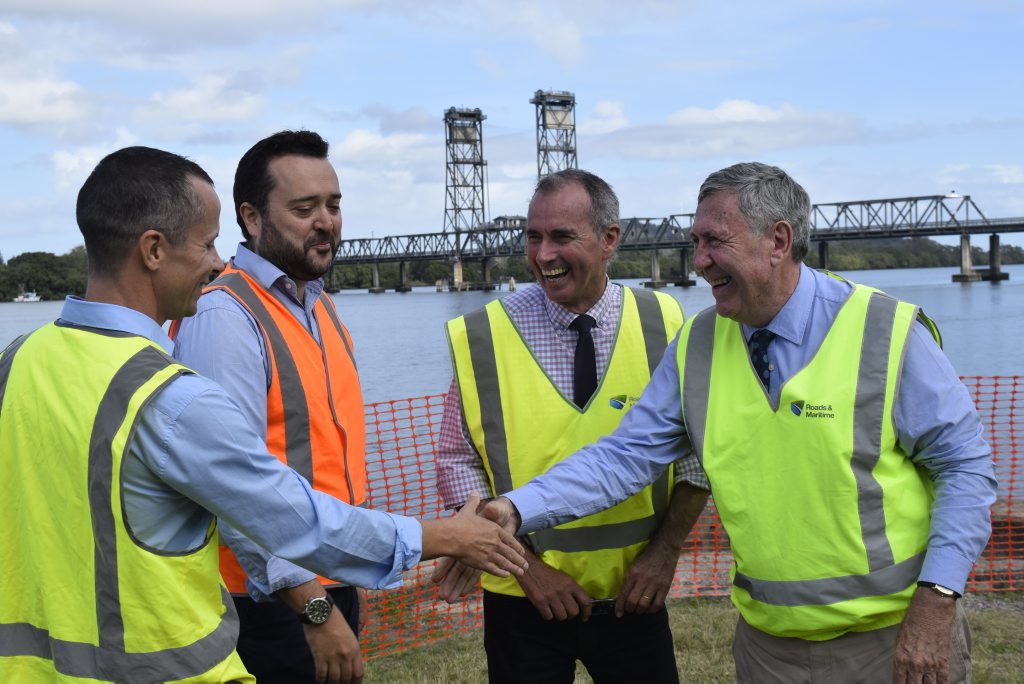 APPROVED: Chris Gulaptis and Duncan Gay (right) congratulate approved tenderers for the Harwood bridge project, Acciona Ferrovial Joint Venture. APPROVED: Chris Gulaptis and Duncan Gay (right) congratulate approved tenderers for the Harwood bridge project, Acciona Ferrovial Joint Venture.