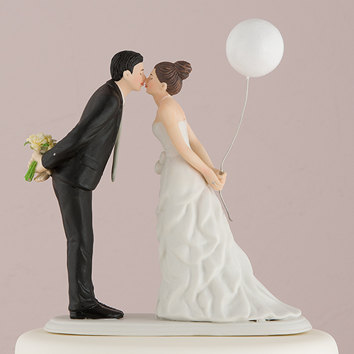 A wedding cake topper is a small model that sits on top of the wedding cake and it might not have been what the thief was hoping for. A wedding cake topper is a small model that sits on top of the wedding cake and it might not have been what the thief was hoping for.