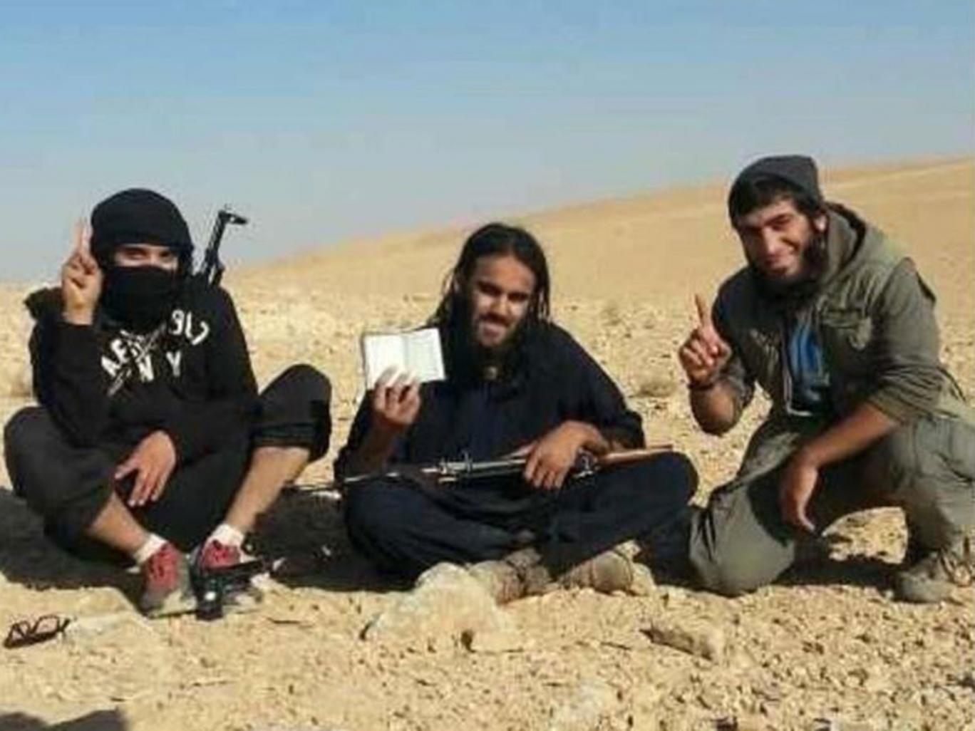 Raphael Hostey (centre), 23, left Manchester to join Isis in 2013 and became a key recruiter of British fighters and jihadi brides for the terror group Twitter Raphael Hostey (centre), 23, left Manchester to join Isis in 2013 and became a key recruiter of British fighters and jihadi brides for the terror group Twitter