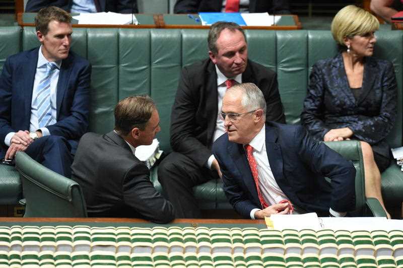 Australian Federal Environment minister Greg Hunt speaks with Australian Prime Minister Malcolm Turnbull (bottom right) during Question Time in the House of Representatives at Parliament House in Canberra, Tuesday, May 3, 2016. Australian Federal Environment minister Greg Hunt speaks with Australian Prime Minister Malcolm Turnbull (bottom right) during Question Time in the House of Representatives at Parliament House in Canberra, Tuesday, May 3, 2016.