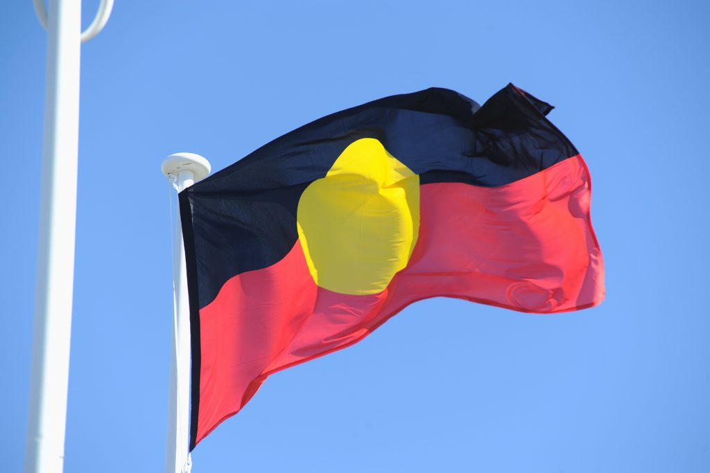 NAIDOC flag raising and awards ceremony at the Fraser Coast Cultural Centre in Hervey Bay - the Aboriginal flag. Photo: Alistair Brightman / Fraser Coast Chronicle NAIDOC flag raising and awards ceremony at the Fraser Coast Cultural Centre in Hervey Bay - the Aboriginal flag. Photo: Alistair Brightman / Fraser Coast Chronicle