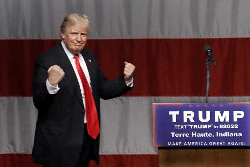 Republican presidential candidate Donald Trump reacts to a song during a campaign rally at the Indiana Theater in Terre Haute, Ind. Republican presidential candidate Donald Trump reacts to a song during a campaign rally at the Indiana Theater in Terre Haute, Ind.