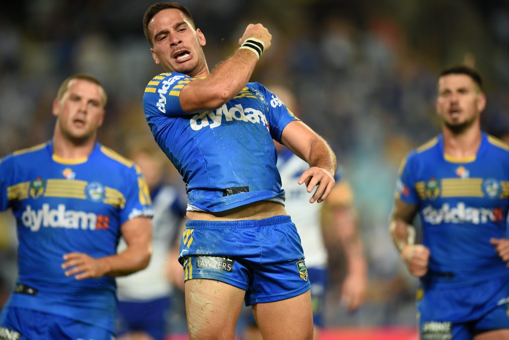 Corey Norman of the Eels celebrates after scoring a try during the round 9 NRL match between the Parramatta Eels and the Canterbury-Bankstown Bulldogs at ANZ Stadium in Sydney, Friday, April 29, 2016. (AAP Image/Dan Himbrechts) NO ARCHIVING, EDITORIAL USE ONLY Corey Norman of the Eels celebrates after scoring a try during the round 9 NRL match between the Parramatta Eels and the Canterbury-Bankstown Bulldogs at ANZ Stadium in Sydney, Friday, April 29, 2016. (AAP Image/Dan Himbrechts) NO ARCHIVING, EDITORIAL USE ONLY