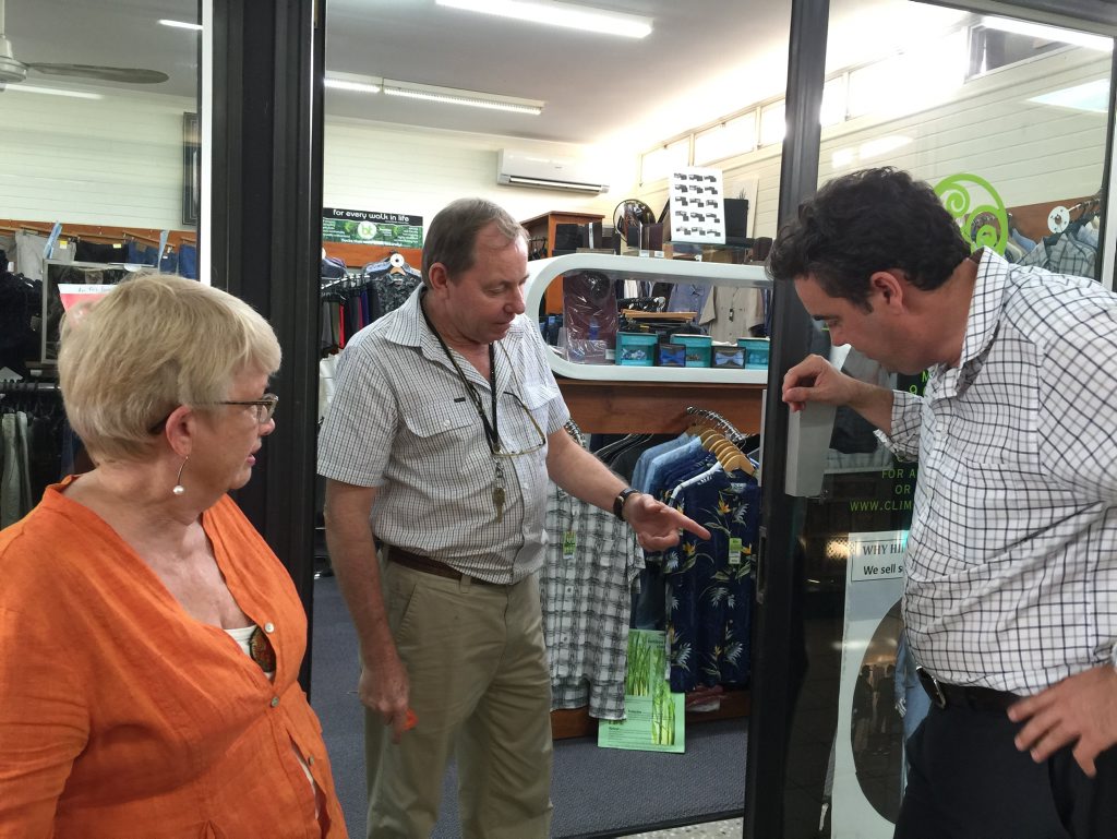 Climate Classic owners Janine and Steve Muller show State Member for Whitsunday Jason Costigan the watch cabinet burglars raided. Contributed