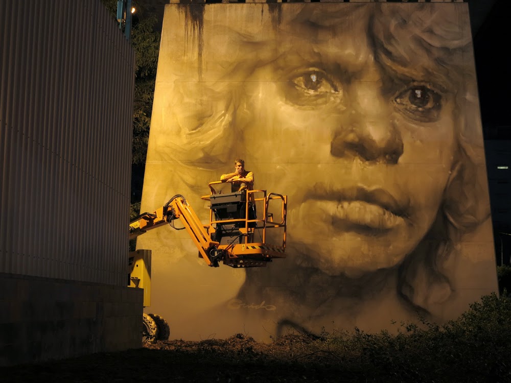 Brisbane artist Guido van Helton with his Pillar Project mural. Brisbane artist Guido van Helton with his Pillar Project mural.