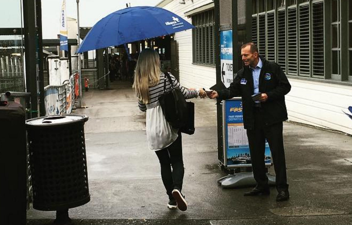 Tony Abbott handing out how to vote cards in Manly. Source: Instagram Tony Abbott handing out how to vote cards in Manly. Source: Instagram