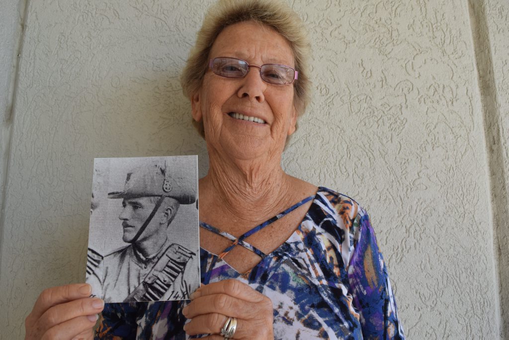 Image for sale: "I THOUGHT THEY'D NEVER FIND HIM": Maxine Hebbard with a photo of her great uncle, James Benson, aged 20. Photo: Eliza Goetze / NewsMail