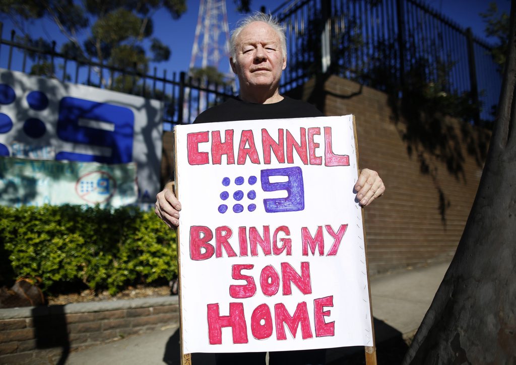David Whittington, the father of Adam Whittington who is still being kept in jail in Lebanon after a failed child abduction operation in April, poses for a photograph duringt a rally to protest at the detention of his son outside the Channel 9 headquarters in Sydney, Tuesday, May 17, 2016. (AAP Image/David Moir) NO ARCHIVING David Whittington, the father of Adam Whittington who is still being kept in jail in Lebanon after a failed child abduction operation in April, poses for a photograph duringt a rally to protest at the detention of his son outside the Channel 9 headquarters in Sydney, Tuesday, May 17, 2016. (AAP Image/David Moir) NO ARCHIVING