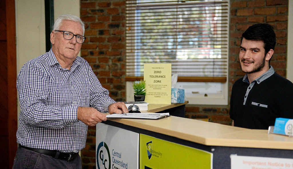 KEY ADVICE: Wayne Jones speaks to student Joshua Morgan about his fears the region’s only community legal service will have to cut services for local residents if the federal government’s funding cuts go ahead. KEY ADVICE: Wayne Jones speaks to student Joshua Morgan about his fears the region’s only community legal service will have to cut services for local residents if the federal government’s funding cuts go ahead.