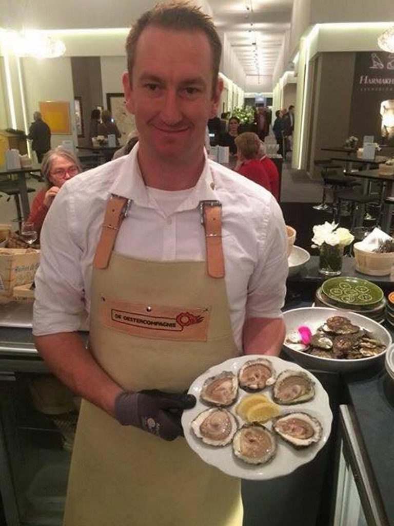 YUMMY OYSTERS: Dwayne Johnston, working as an oysterman at the The European Fine Art Fair.