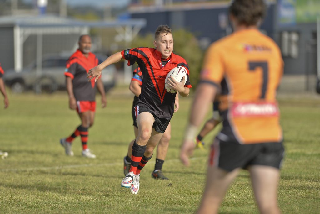 Image for sale: Rebels' Jake Thomas powers through