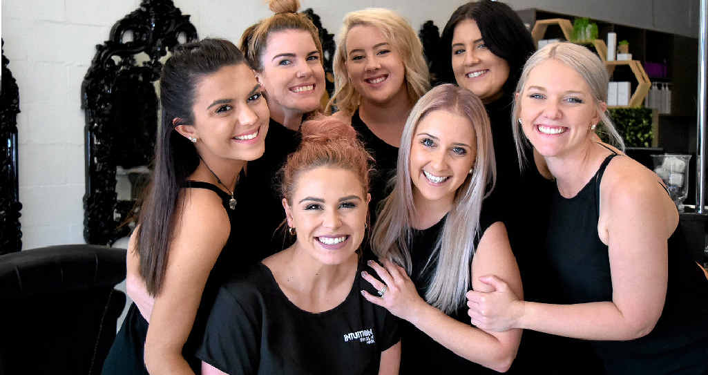 TOGETHER: Intuition: The Art of Hair staff Kayla Vella (back left), Larissa Anderson, Brittany Miller, Kate Turvey, and Victoria Edwards (front left), owner Sammy Hayes and Meryn Dunn, couldn’t be happier with their workplace. TOGETHER: Intuition: The Art of Hair staff Kayla Vella (back left), Larissa Anderson, Brittany Miller, Kate Turvey, and Victoria Edwards (front left), owner Sammy Hayes and Meryn Dunn, couldn’t be happier with their workplace.