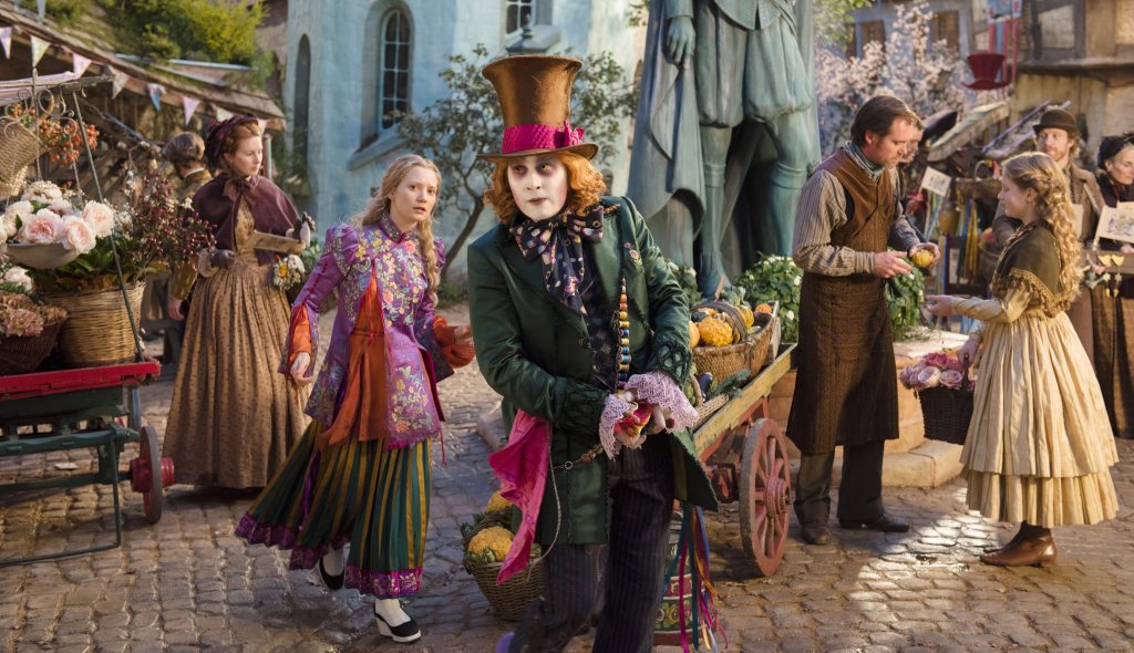 Mia Wasikowska and Johnny Depp in a scene from the movie Alice Through the Looking Glass. Mia Wasikowska and Johnny Depp in a scene from the movie Alice Through the Looking Glass.