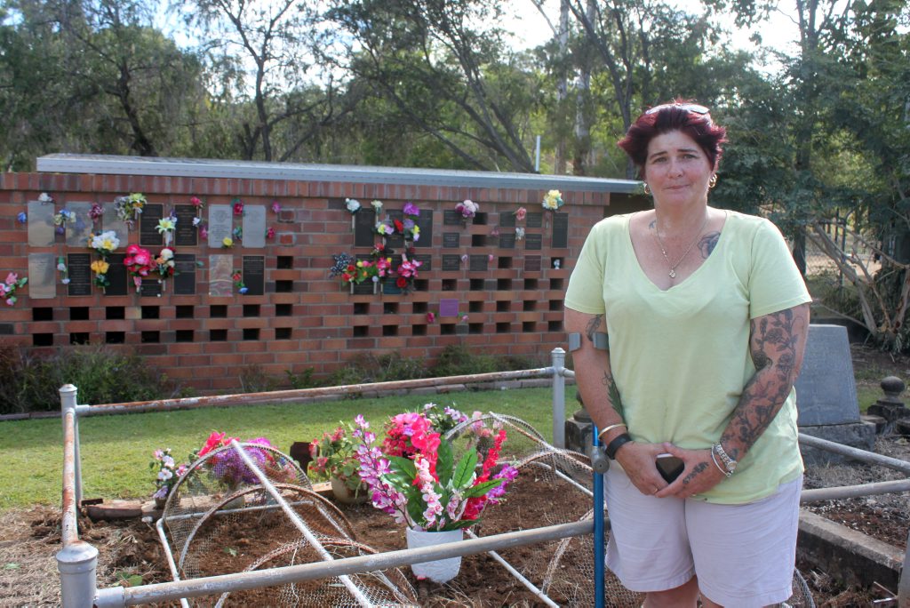 RESTING SPOT: Raechel Summers feared her grandmother, Ramona Mary Williams, would not be buried alongside her husband and parents when she discovered the wrong plot had been dug the morning of her funeral.Photo Amber Hooker / The Morning Bulletin RESTING SPOT: Raechel Summers feared her grandmother, Ramona Mary Williams, would not be buried alongside her husband and parents when she discovered the wrong plot had been dug the morning of her funeral.Photo Amber Hooker / The Morning Bulletin