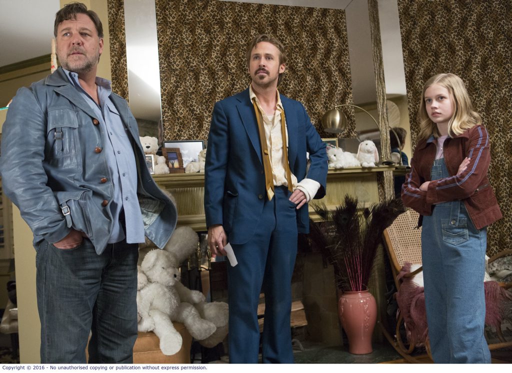 Russell Crowe, Ryan Gosling and Angourie Rice in a scene from The Nice Guys. Russell Crowe, Ryan Gosling and Angourie Rice in a scene from The Nice Guys.
