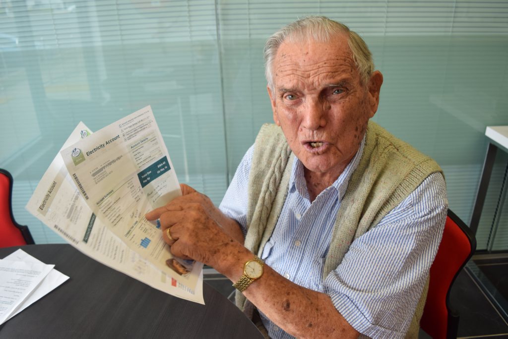 Douglas Peterson is angry about the extra charges on his electricity bill. Photo Ashley Clark / NewsMail Douglas Peterson is angry about the extra charges on his electricity bill. Photo Ashley Clark / NewsMail