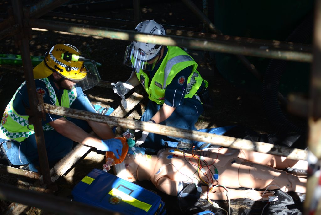 FIRST AID: QAS treat a patient under the Burnett Bridge during a training exercise. Photo: Ben Turnbull FIRST AID: QAS treat a patient under the Burnett Bridge during a training exercise. Photo: Ben Turnbull
