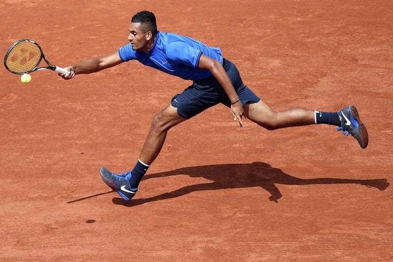 Nick Kyrgios of Australia in action against Richard Gasquet of France during their men's single third round match at the French Open tennis tournament at Roland Garros in Paris, France, 27 May 2016. Nick Kyrgios of Australia in action against Richard Gasquet of France during their men's single third round match at the French Open tennis tournament at Roland Garros in Paris, France, 27 May 2016.