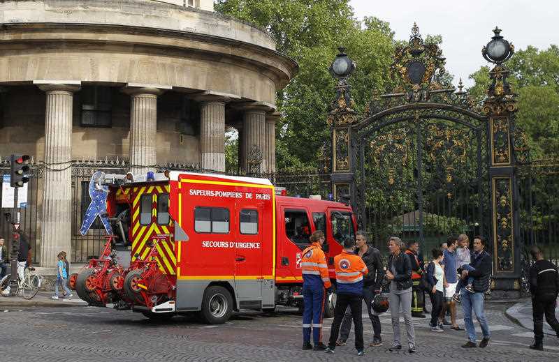 A fire truck is parked at the entrance to Monceau parc in the center of Paris, France, Saturday, May 28, 2016, after a lightning bolt crashed down onto a Paris park, striking 11 people at a child's birthday party. A fire truck is parked at the entrance to Monceau parc in the center of Paris, France, Saturday, May 28, 2016, after a lightning bolt crashed down onto a Paris park, striking 11 people at a child's birthday party.