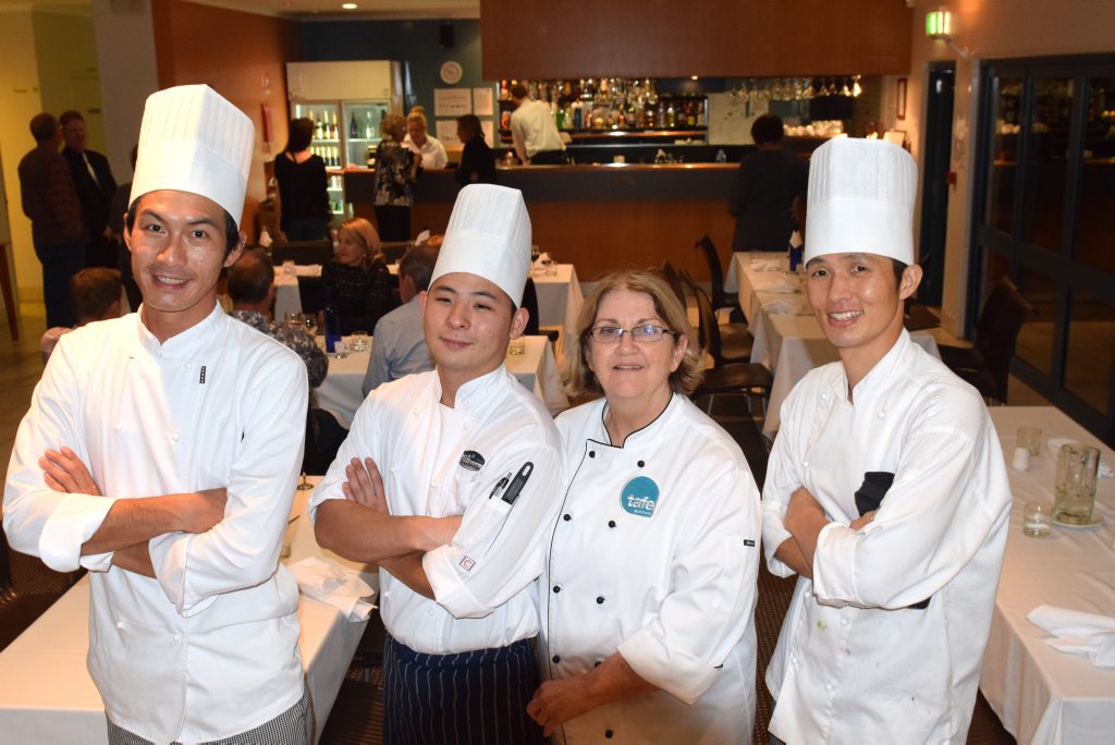 MASTER CHEFS: Tafe students On Cheung, Tak Tanaka and Sang Young Jean with cooking instructor Robyn De George after cooking up a gorumet ten course meal. MASTER CHEFS: Tafe students On Cheung, Tak Tanaka and Sang Young Jean with cooking instructor Robyn De George after cooking up a gorumet ten course meal.