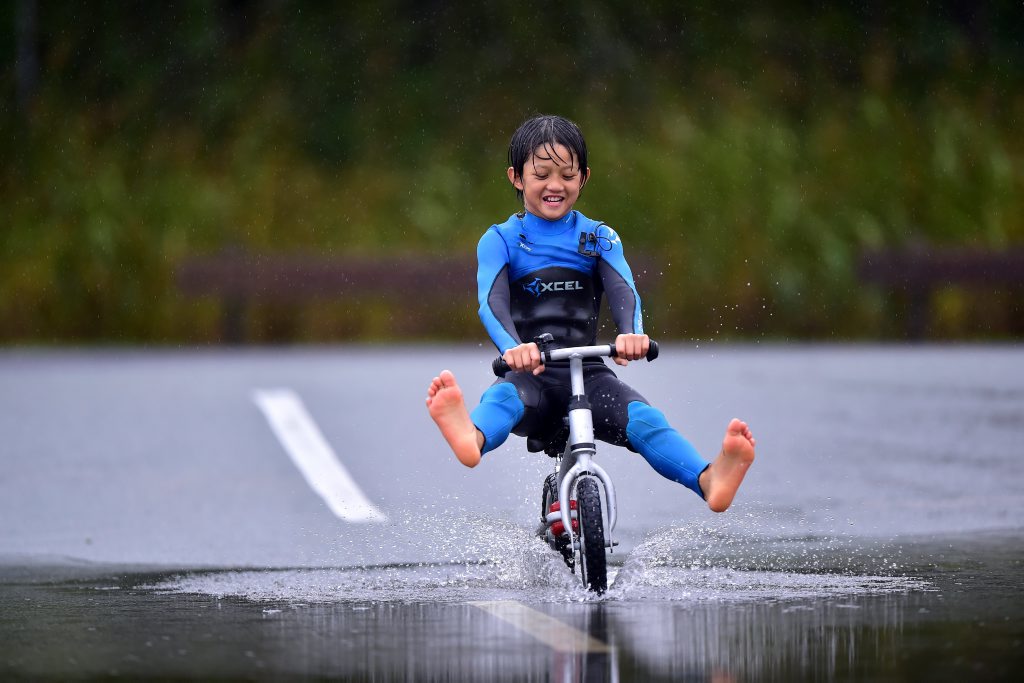 Junior soccer was cancelled for 11-year-old Winston Clemmer due to the wet weather, but that didn't stop him making the most of his local soaked grounds in Maroochydore. Junior soccer was cancelled for 11-year-old Winston Clemmer due to the wet weather, but that didn't stop him making the most of his local soaked grounds in Maroochydore.