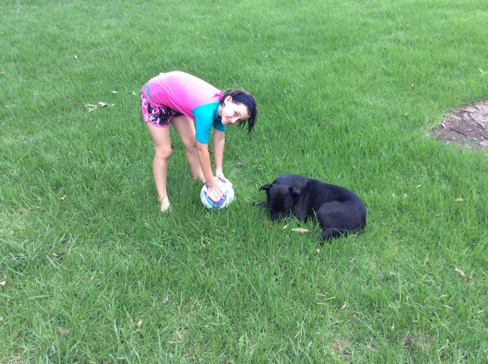 Mr Mackeens' step-daughter, Chelsea-Jayd Taylor plays with Max. Mr Mackeens' step-daughter, Chelsea-Jayd Taylor plays with Max.