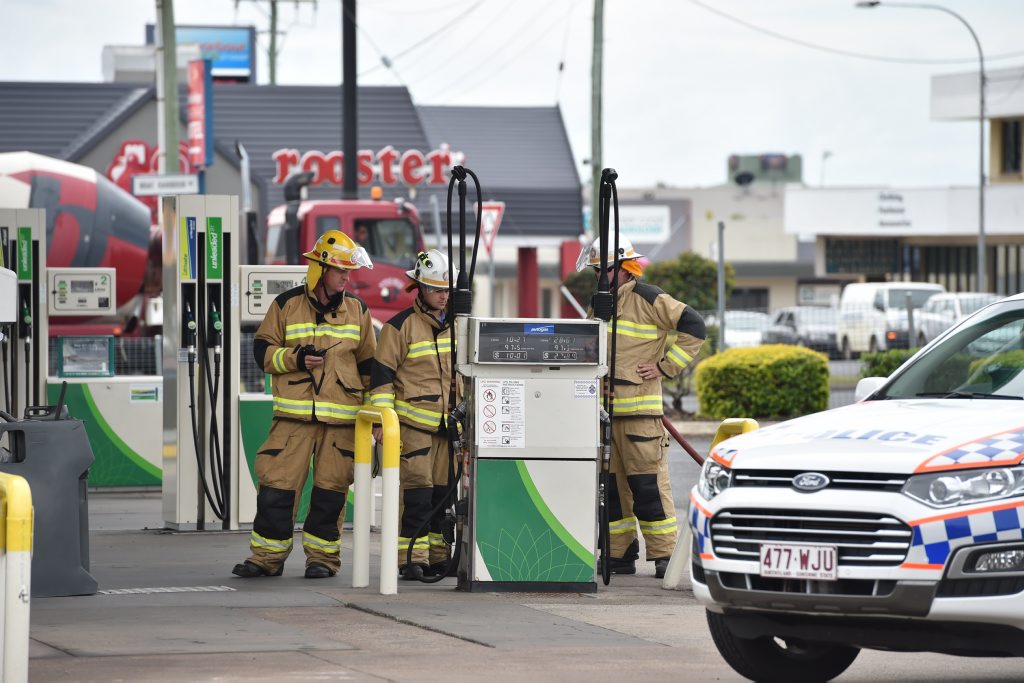 Firies at the BP service station at Pialba after a motorist backed into the gas pump before driving off.Photo: Alistair Brightman / Fraser Coast Chronicle Firies at the BP service station at Pialba after a motorist backed into the gas pump before driving off.Photo: Alistair Brightman / Fraser Coast Chronicle