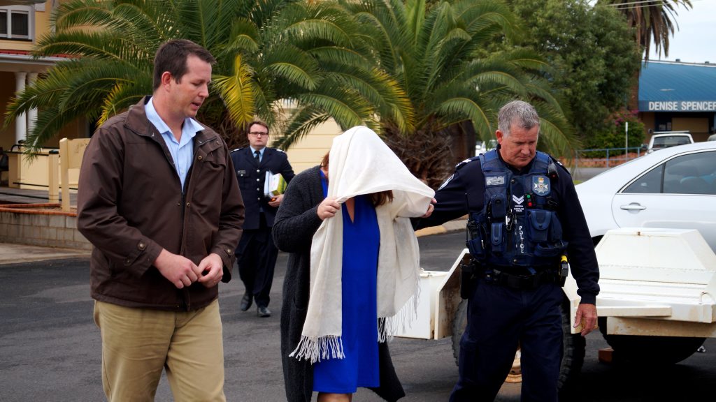 Veronica Chung is led away by police following her sentencing. Veronica Chung is led away by police following her sentencing.
