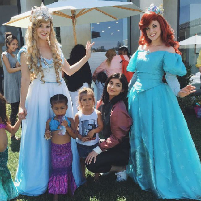 North West and Penelope Disick at their mermaid-themed birthday party, with aunt Kylie Jenner. North West and Penelope Disick at their mermaid-themed birthday party, with aunt Kylie Jenner.