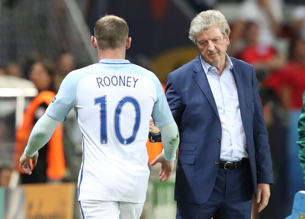 England coach Roy Hodgson salutes Wayne Rooney as he leaves the pitch to be replaced during the Euro 2016 round of 16 soccer match between England and Iceland, at the Allianz Riviera stadium in Nice, France, Monday, June 27, 2016. (AP Photo/Thanassis Stavrakis) England coach Roy Hodgson salutes Wayne Rooney as he leaves the pitch to be replaced during the Euro 2016 round of 16 soccer match between England and Iceland, at the Allianz Riviera stadium in Nice, France, Monday, June 27, 2016. (AP Photo/Thanassis Stavrakis)