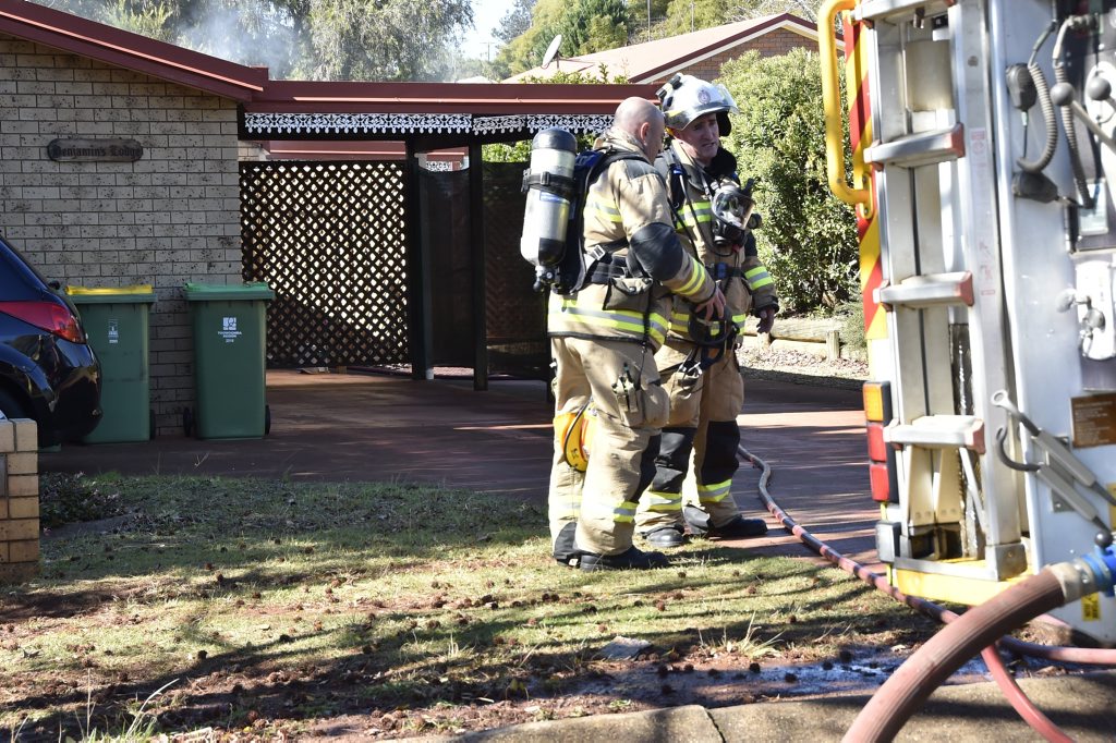Firefighters extinguish a fire in a unit, Claret St, Wilsonton. Firefighters extinguish a fire in a unit, Claret St, Wilsonton.