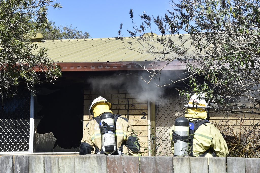 Firefighters extinguish a fire in a unit, Claret St, Firefighters extinguish a fire in a unit, Claret St,