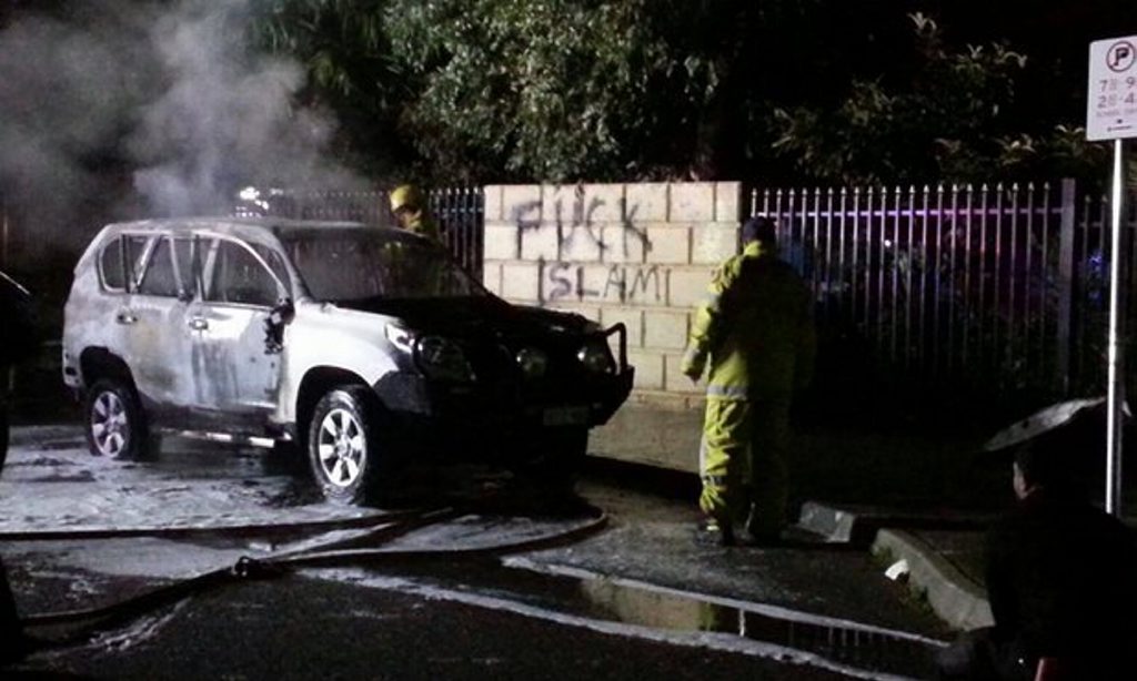 A car was burnt and anti-Islamic graffiti sprayed on a fence outside a Perth mosque on Tuesday night. A car was burnt and anti-Islamic graffiti sprayed on a fence outside a Perth mosque on Tuesday night.