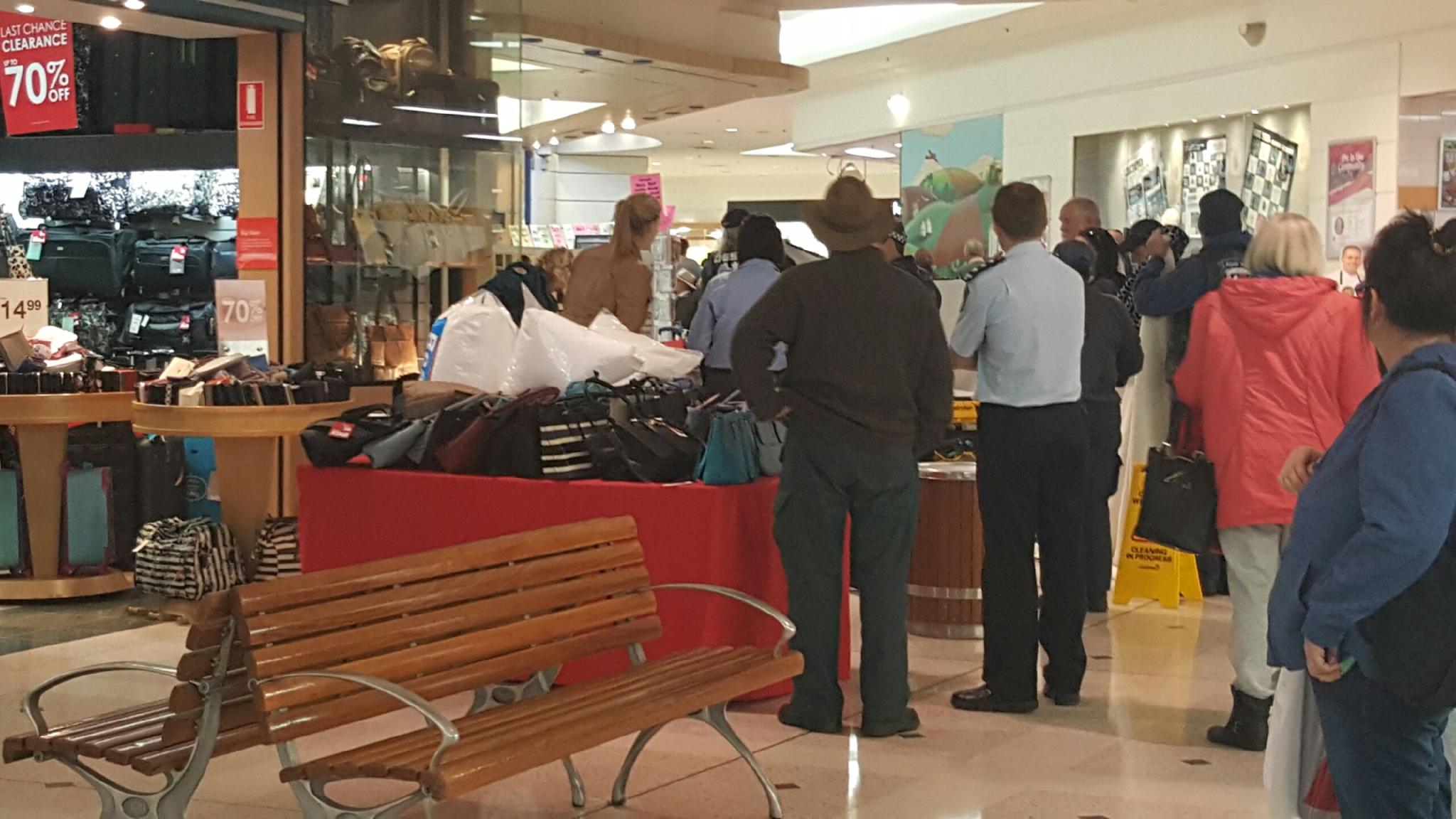Shocked shoppers watch on as paramedics perform CPR on a person who collapsed inside Rose City Shoppingworld. Shocked shoppers watch on as paramedics perform CPR on a person who collapsed inside Rose City Shoppingworld.