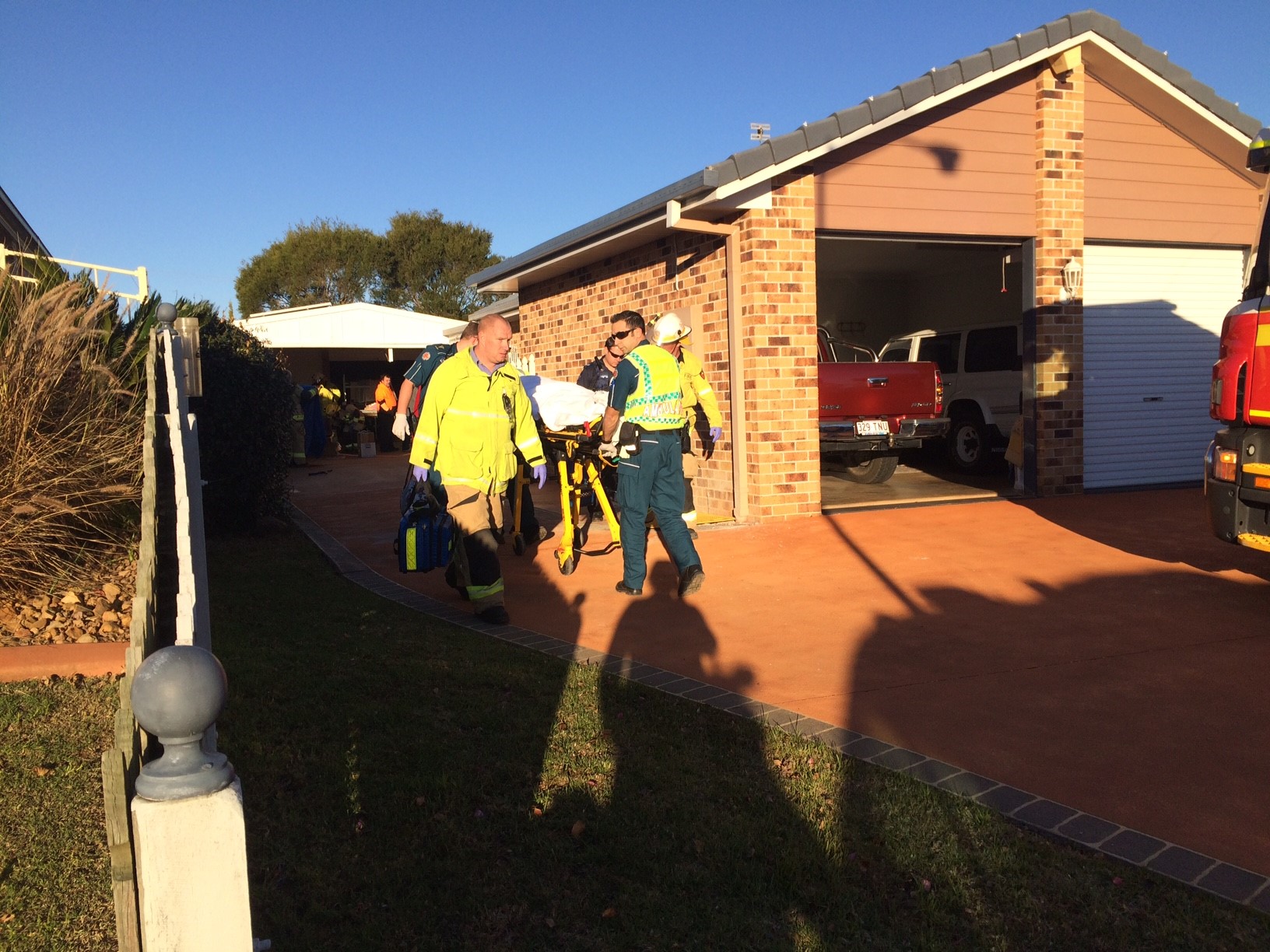 A man has been freed after being trapped under trailer. A man has been freed after being trapped under trailer.