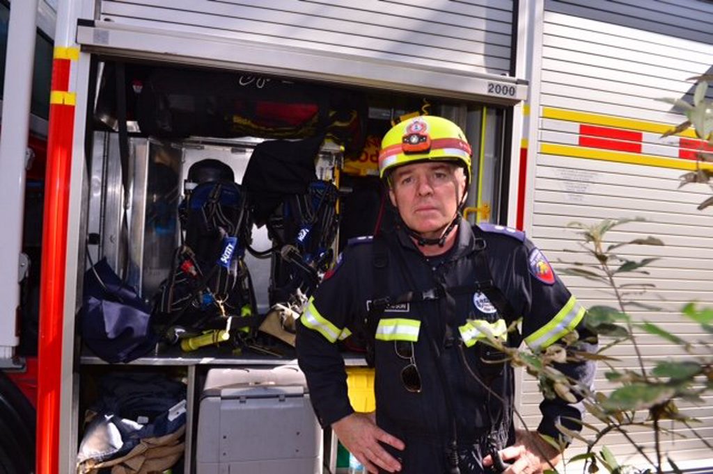 Firefighter Peter Watson at Mt Tibrogargan Firefighter Peter Watson at Mt Tibrogargan