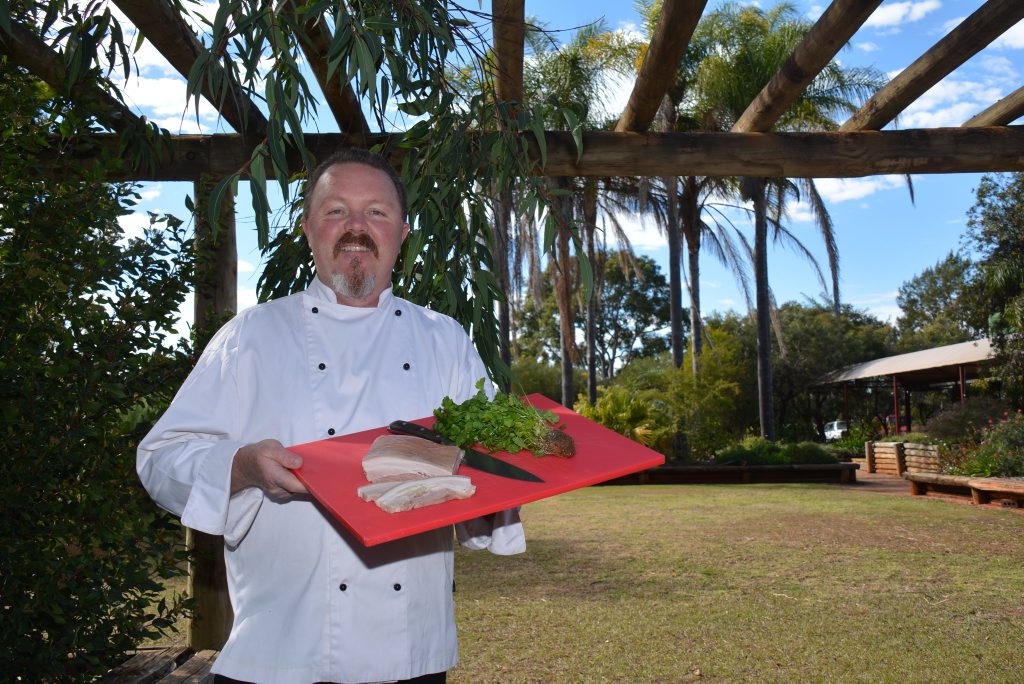 REGIONAL FLAVOURS: Jason Ford prepares the region's famous pork belly wrap, ahead of the South Bank event. REGIONAL FLAVOURS: Jason Ford prepares the region's famous pork belly wrap, ahead of the South Bank event.