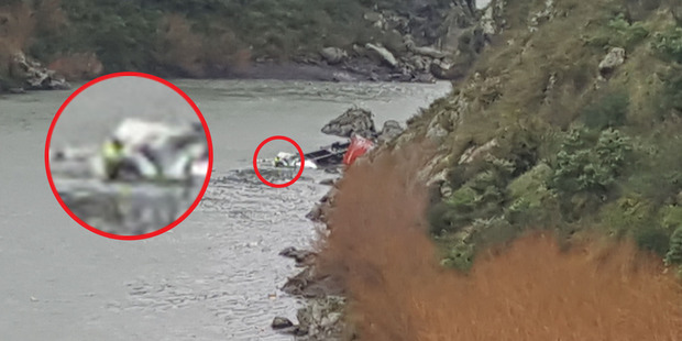 A motorist who came across a truck crash down a steep gorge ravine says he couldn't believe it when he saw someone standing on top of the crumpled wreck. A motorist who came across a truck crash down a steep gorge ravine says he couldn't believe it when he saw someone standing on top of the crumpled wreck.