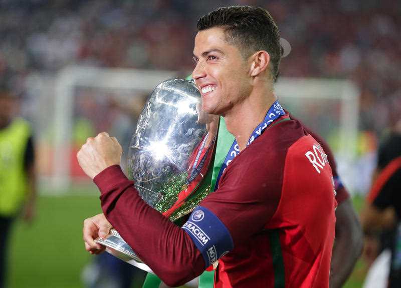 Portugal's Cristiano Ronaldo holds the trophy after winning the Euro 2016 final soccer match between Portugal and France at the Stade de France in Saint-Denis, north of Paris, Sunday, July 10, 2016. Portugal's Cristiano Ronaldo holds the trophy after winning the Euro 2016 final soccer match between Portugal and France at the Stade de France in Saint-Denis, north of Paris, Sunday, July 10, 2016.
