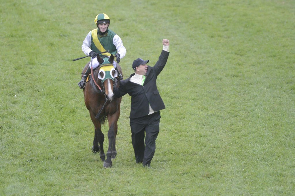 Stable foreman for trainer Ross Stitt Terry Hoare (right) salutes the crowd as he brings back Ramornie Handicap Winner Youthful Jack riddden by Robert Thompson Photo Adam Hourigan / The Daily Examiner Stable foreman for trainer Ross Stitt Terry Hoare (right) salutes the crowd as he brings back Ramornie Handicap Winner Youthful Jack riddden by Robert Thompson Photo Adam Hourigan / The Daily Examiner