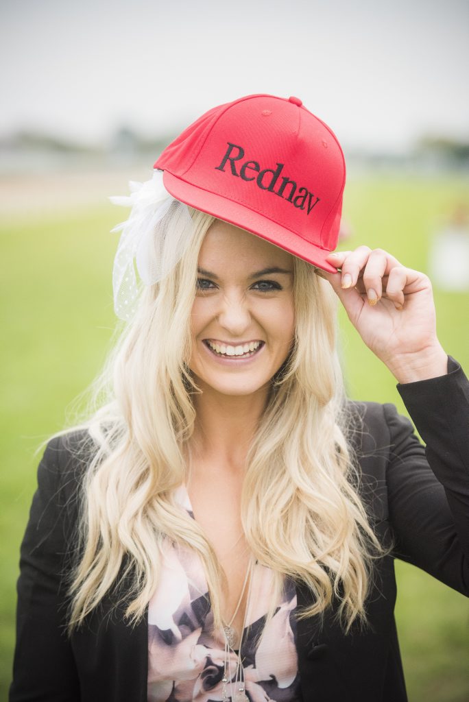 Trainer Sally Taylor can't get the smile off her face as she dons one of her owners caps after her horse Rednav won the Grafton Cup. Trainer Sally Taylor can't get the smile off her face as she dons one of her owners caps after her horse Rednav won the Grafton Cup.