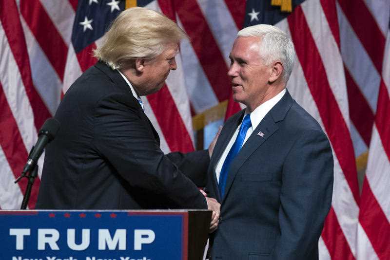 Republican presidential candidate Donald Trump, left, shakes hands with Gov. Mike Pence, R-Ind., during a campaign event to announce Pence as the vice presidential running mate on, Saturday, July 16, 2016, in New York. Republican presidential candidate Donald Trump, left, shakes hands with Gov. Mike Pence, R-Ind., during a campaign event to announce Pence as the vice presidential running mate on, Saturday, July 16, 2016, in New York.