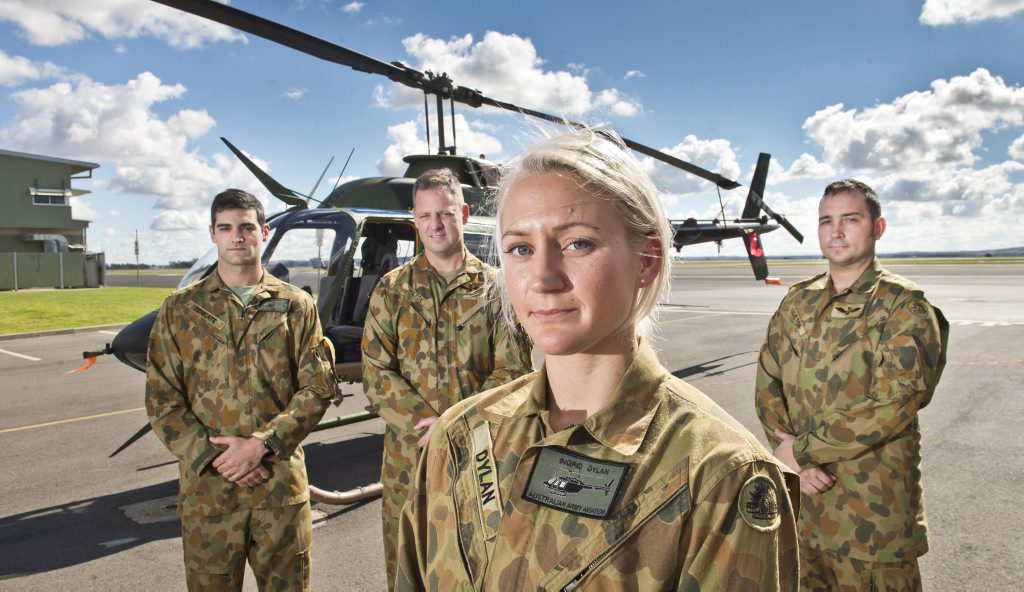 ( From left) Lt Michael Tenkate, Capt Warren Wilton, Officer Cadet Ingrid Dylan and Capt Gary Hamilton. The two helicopter crews involved in performing a rescue mission as a result of a burning crashed vehicle near Cooyar. Friday July 22 , 2016. ( From left) Lt Michael Tenkate, Capt Warren Wilton, Officer Cadet Ingrid Dylan and Capt Gary Hamilton. The two helicopter crews involved in performing a rescue mission as a result of a burning crashed vehicle near Cooyar. Friday July 22 , 2016.
