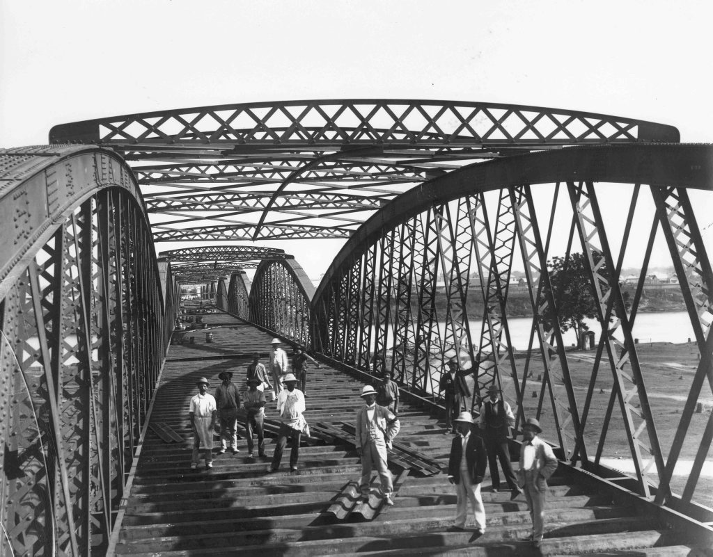 BUILDING HISTORY: Workers in the middle of construction on the Burnett Traffic Bridge in 1899. Photo Courtesy of Picture Bundaberg