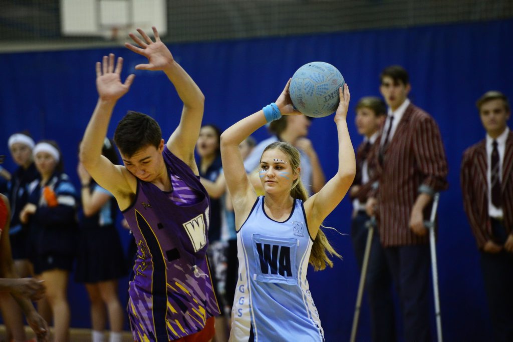 Ipswich Girls Grammar School Vs Ipswich Grammar School prefect netball match at IGGS (boys vs girls). IGGS player Shannon Trigger dominates her opponent. Ipswich Girls Grammar School Vs Ipswich Grammar School prefect netball match at IGGS (boys vs girls). IGGS player Shannon Trigger dominates her opponent.