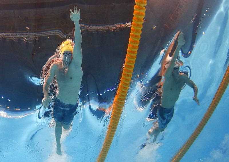 Australia's James Magnussen, and Russia's Nikita Lobintsev, right, compete in a Men's 100m freestyle semifinal at the FINA Swimming World Championships in Barcelona, Spain, Wednesday, July 31, 2013. Australia's James Magnussen, and Russia's Nikita Lobintsev, right, compete in a Men's 100m freestyle semifinal at the FINA Swimming World Championships in Barcelona, Spain, Wednesday, July 31, 2013.