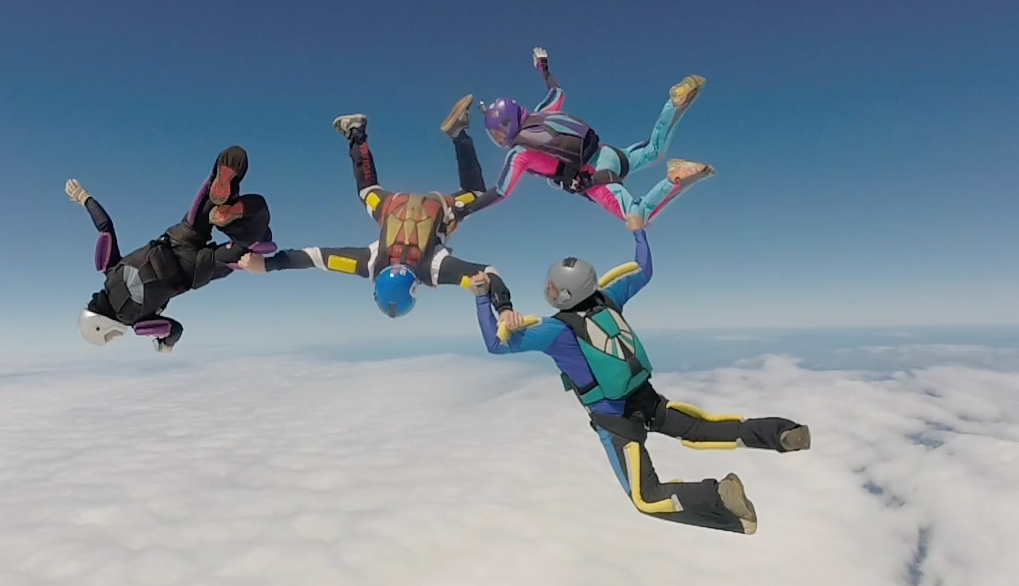 FORMATION: Jonell Goss and Prop Wash form up in the Queensland State Skydiving Championships. 
Photo contributed.